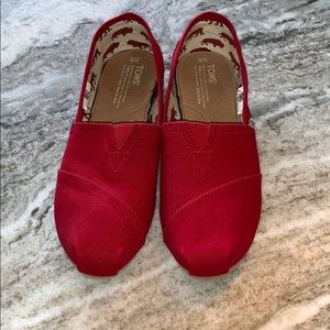 Toms red slip on shoes